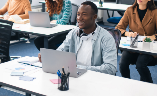 Man smiling in class